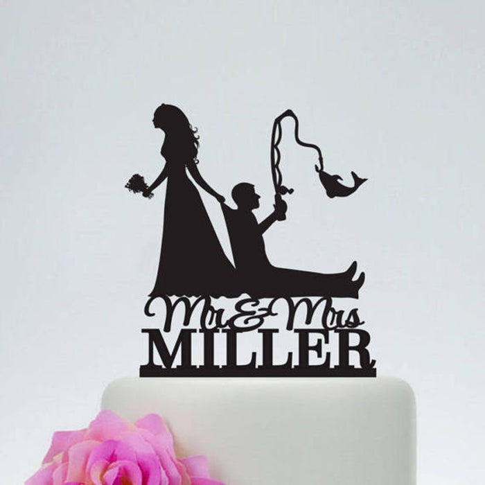 Bride pulling groom funny caketopper